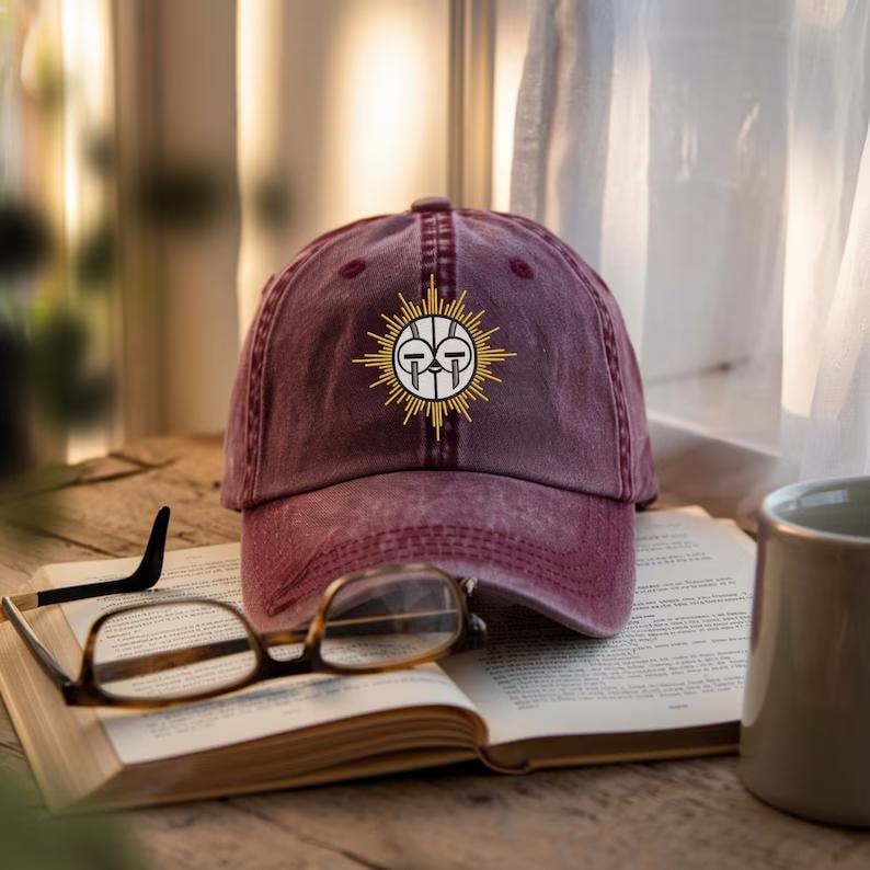 Sun Warrior Mask Embroidered Washed Dad Hat