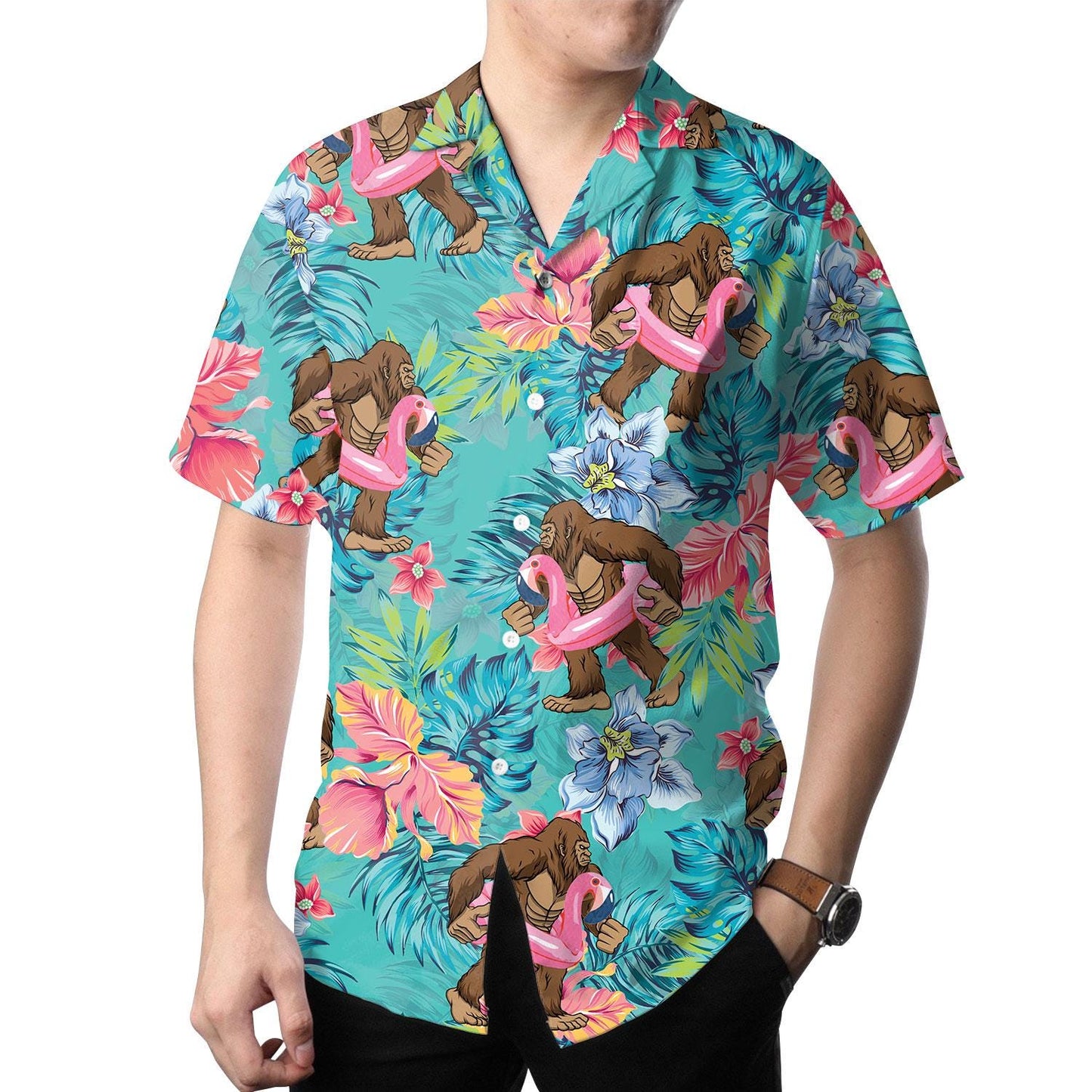 Model wearing the turquoise ape and pink flamingo Hawaiian shirt with tropical flowers