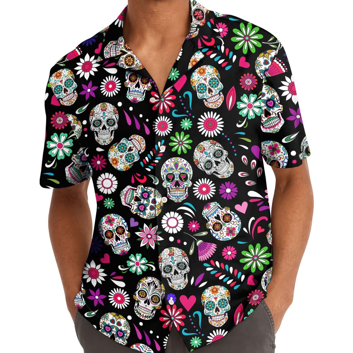 Model wearing a colorful sugar skull Hawaiian shirt outdoors