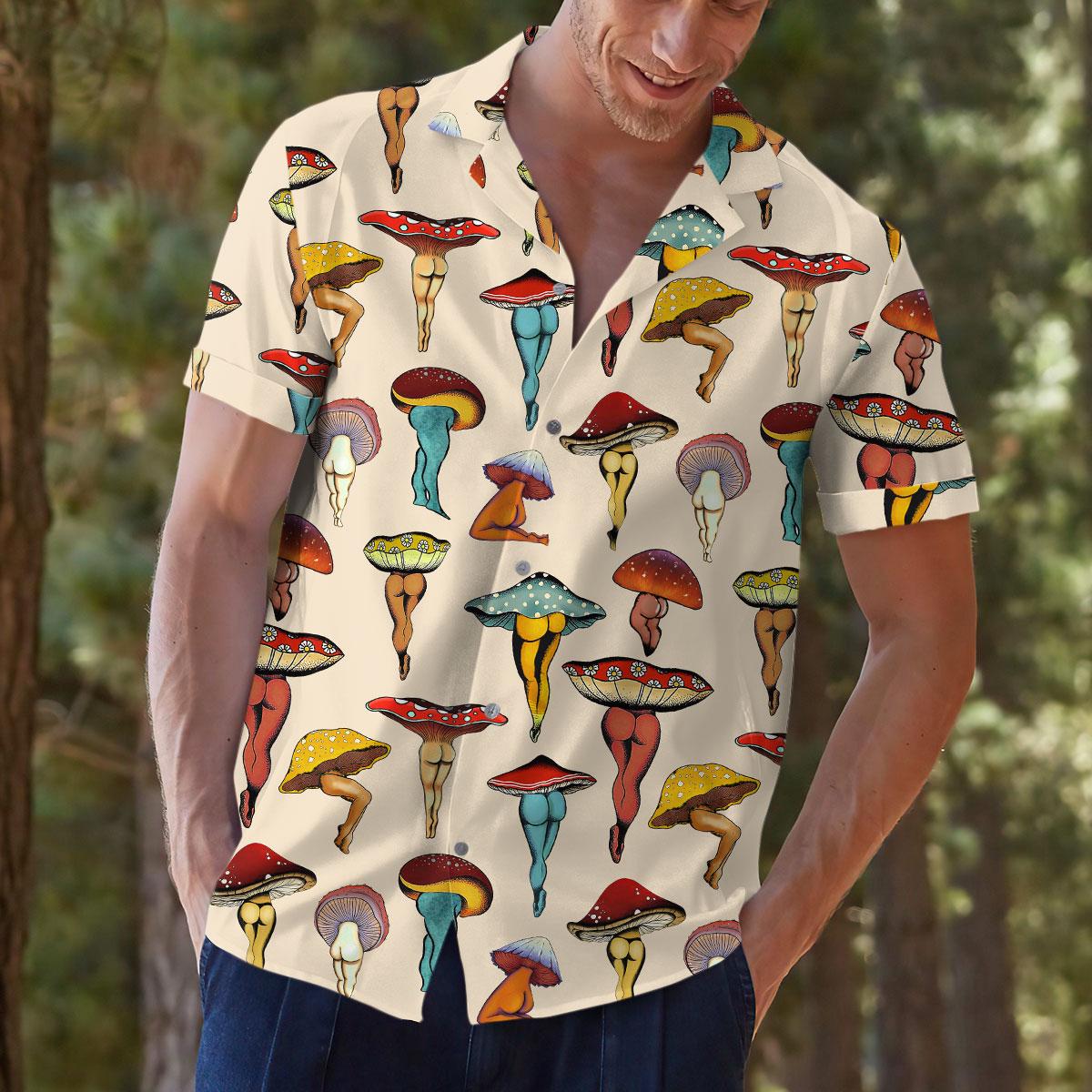Outdoor model wearing a cream fungi-pattern Hawaiian shirt