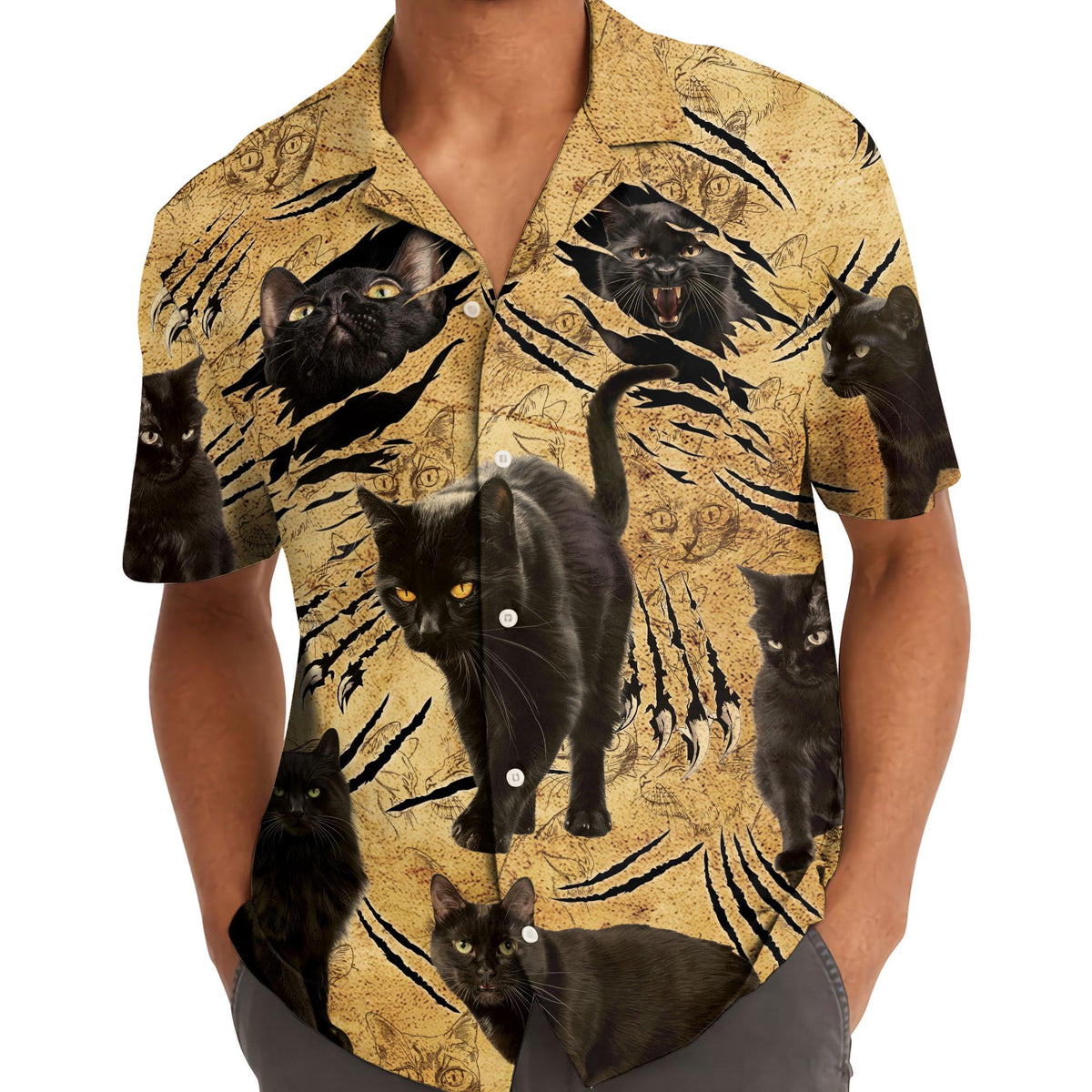 Man wearing a golden black cat Hawaiian shirt with an open collar