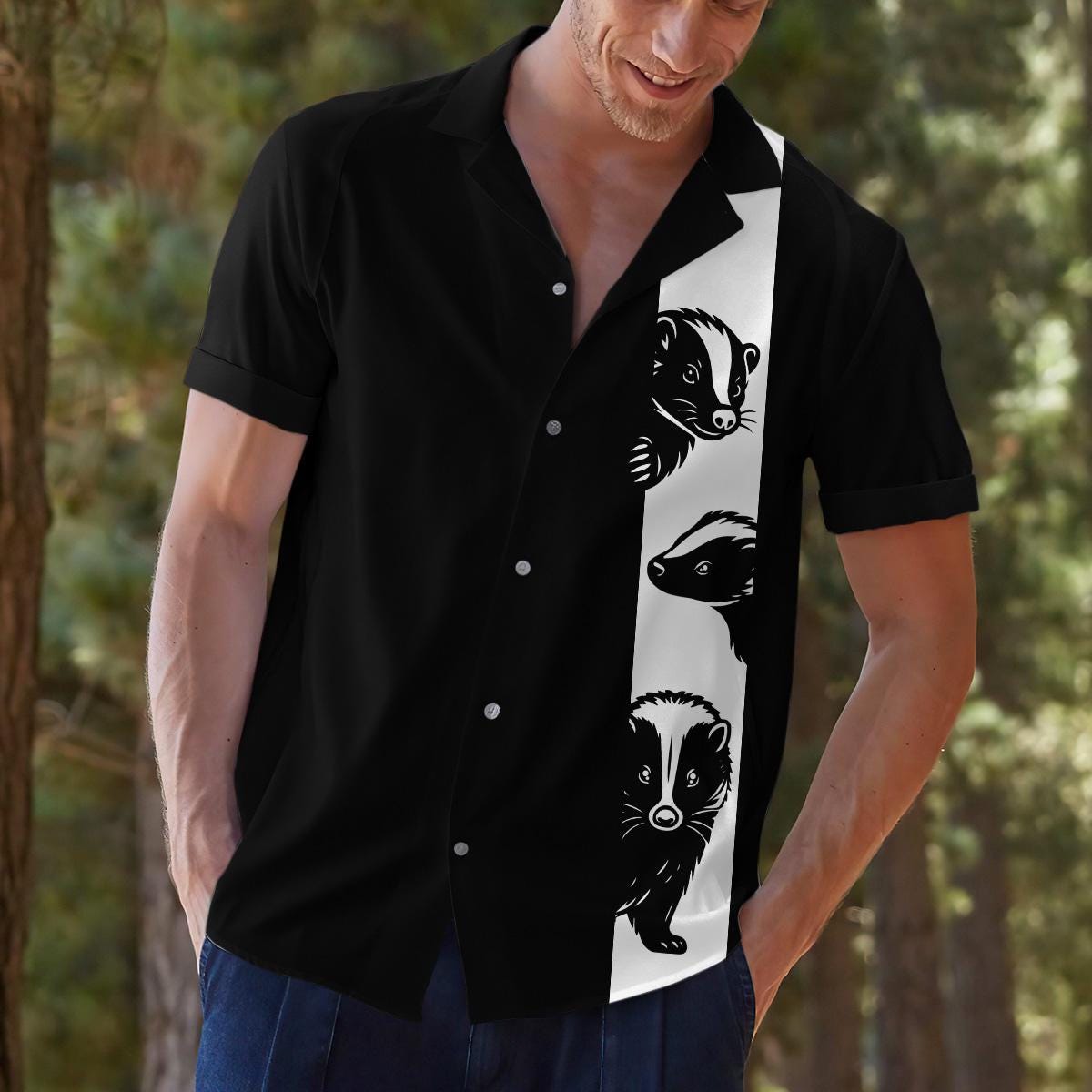 Model wearing black woodland animal Hawaiian shirt outdoors