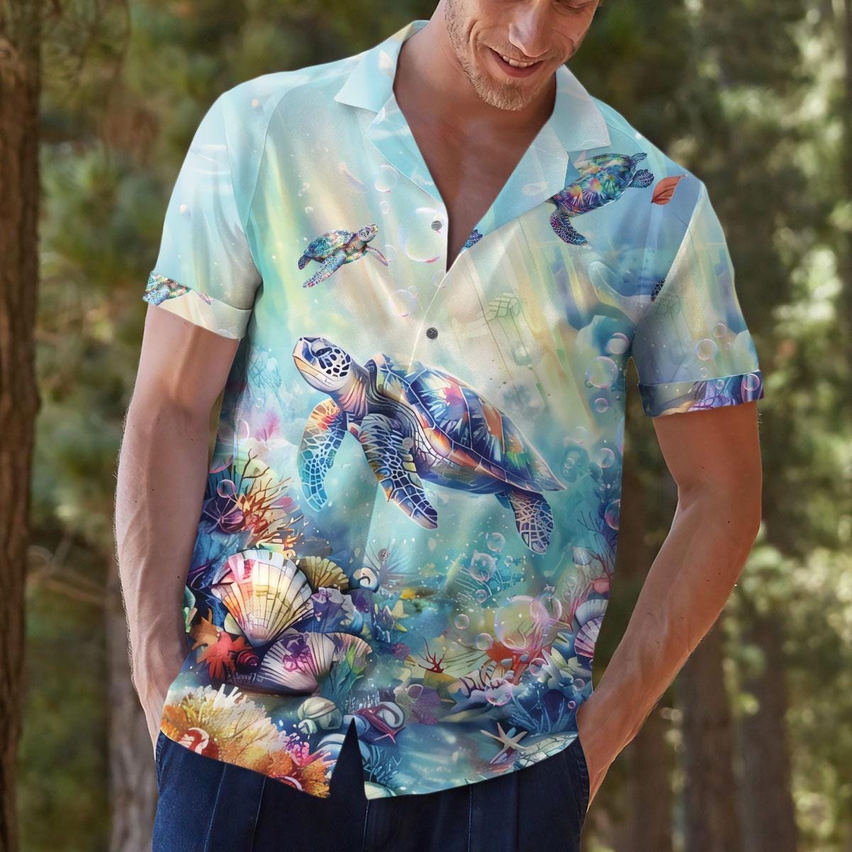 Model wearing a colorful tropical sea turtle shirt outdoors
