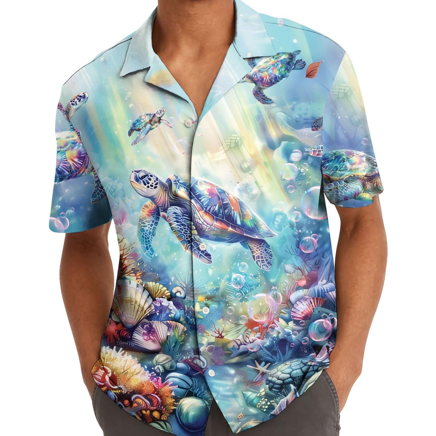 Model wearing a sea turtle Hawaiian shirt with vibrant ocean print