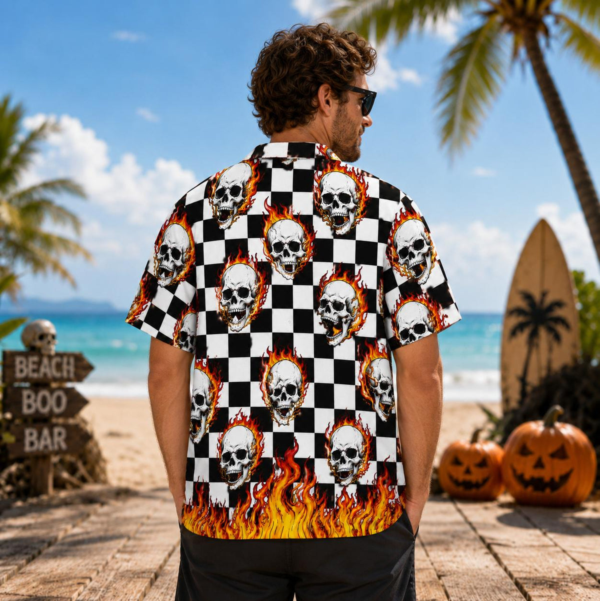 Back view of a model wearing a skull and flame Hawaiian shirt