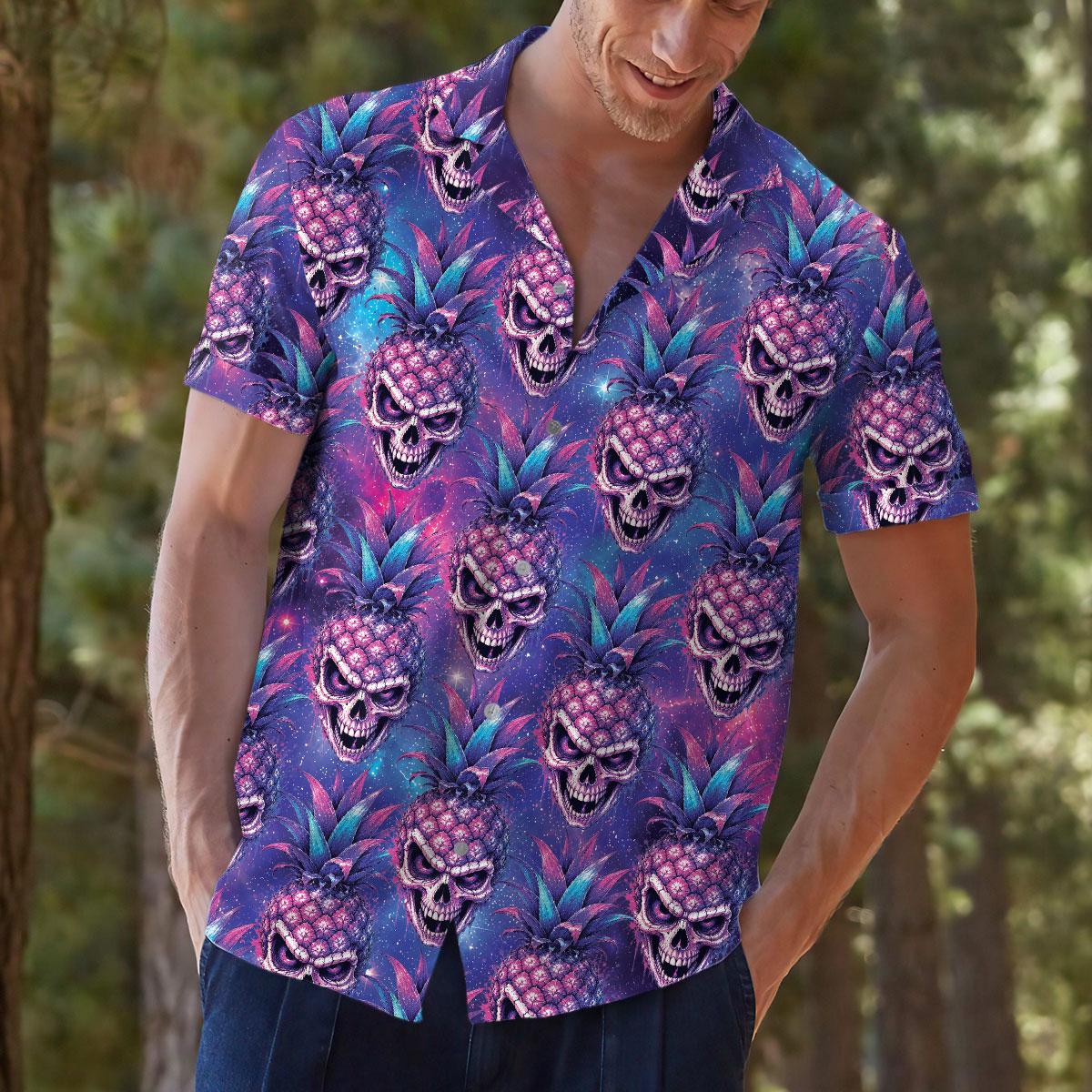 Person wearing a purple pineapple skull Hawaiian shirt in a casual outdoor setting
