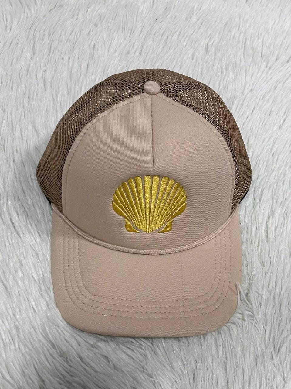 Beige and brown mesh trucker hat with gold seashell embroidery