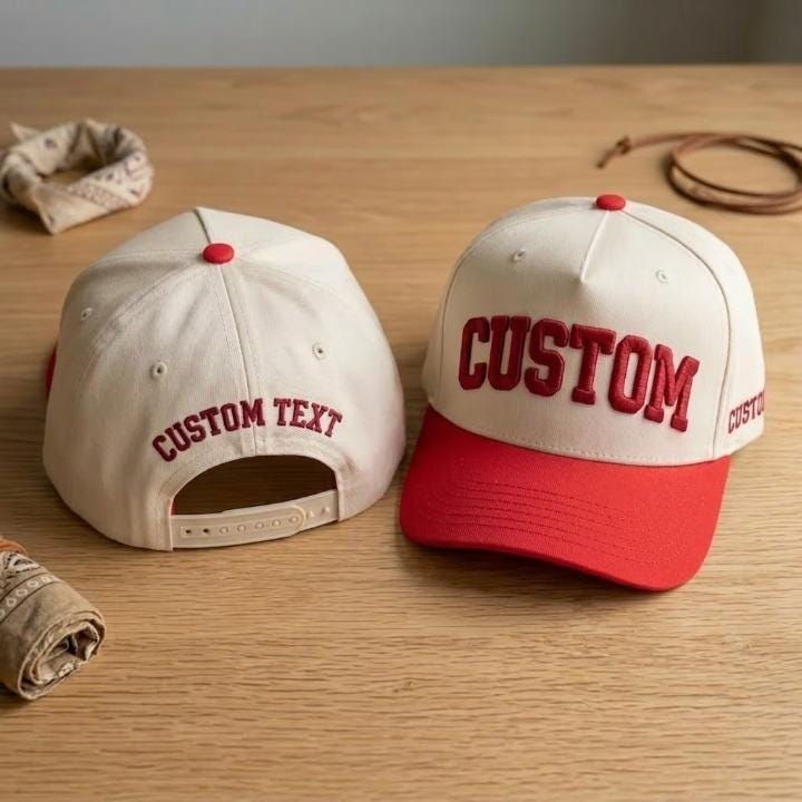 Personalized cream baseball cap with bright red brim and red embroidered lettering