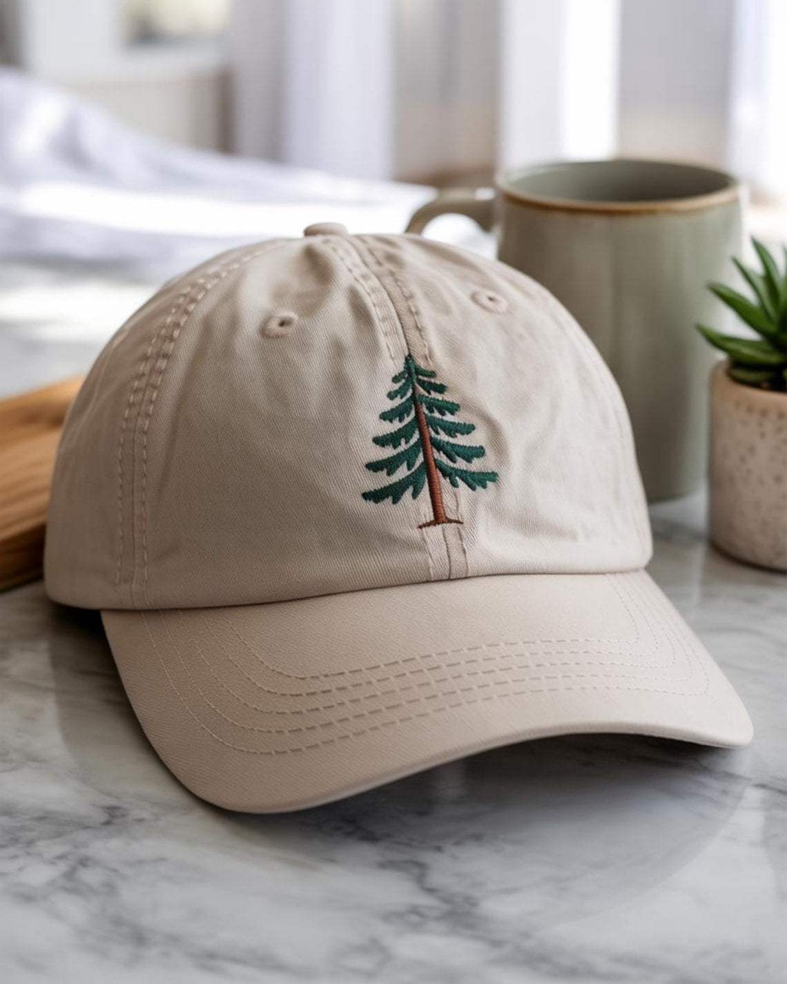 Beige dad hat with embroidered pine tree in forest green