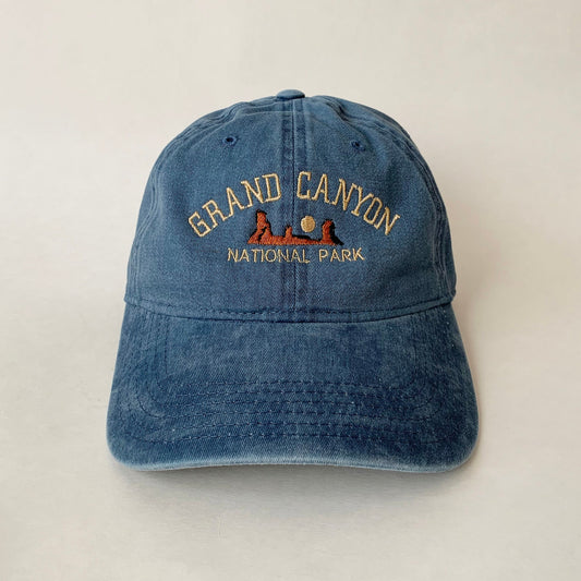 Washed blue dad hat embroidered with Grand Canyon National Park scene and text – ideal for hikers and park lovers