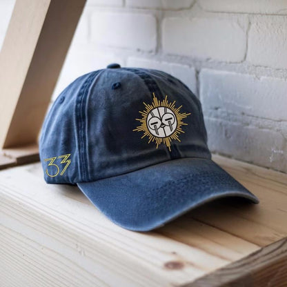 Sun Warrior Mask Embroidered Washed Dad Hat