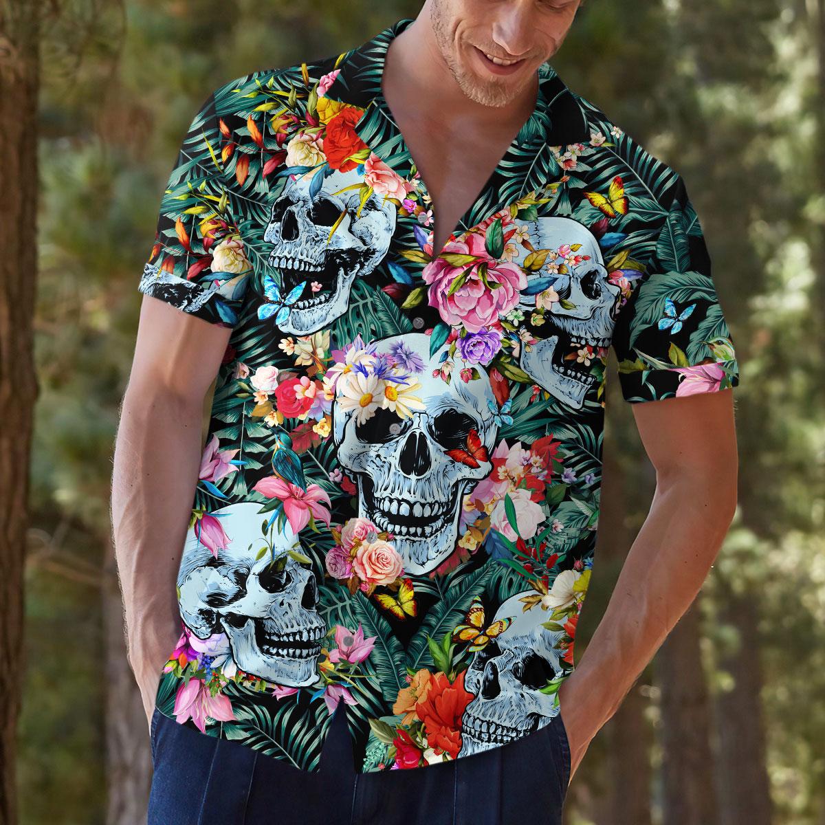 Model wearing skull floral Hawaiian shirt outdoors