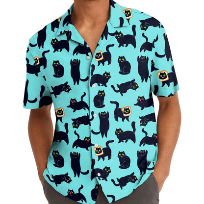 Model wearing an aqua black cat Hawaiian shirt outdoors