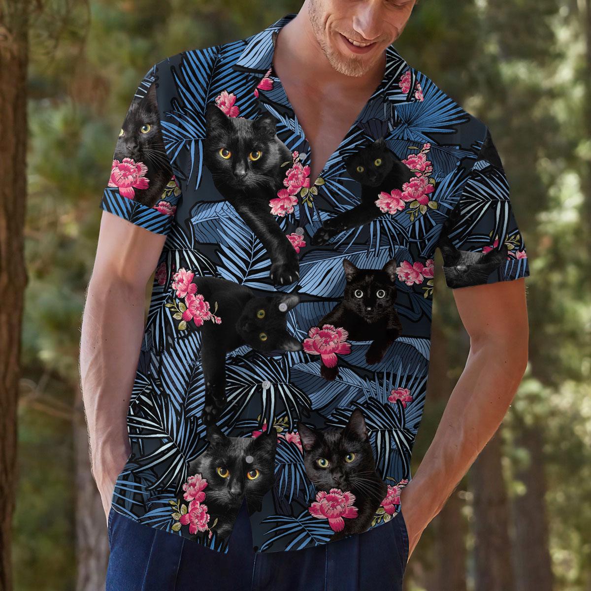 Model wearing black cat floral Hawaiian shirt outdoors