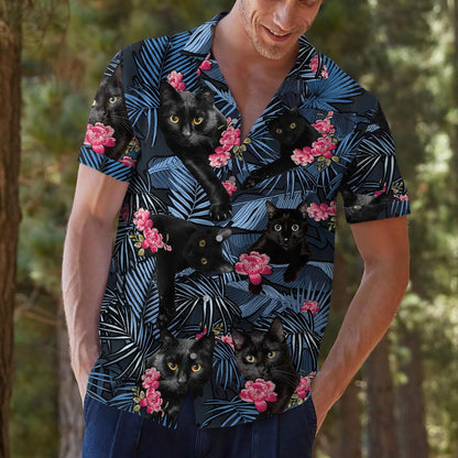 Model wearing black cat floral Hawaiian shirt outdoors
