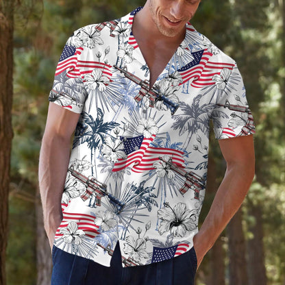 Model wearing patriotic tropical shirt with red white and blue allover print