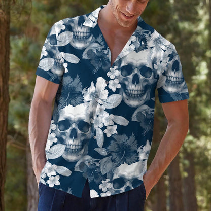 Model wearing a navy skull floral Hawaiian shirt outdoors