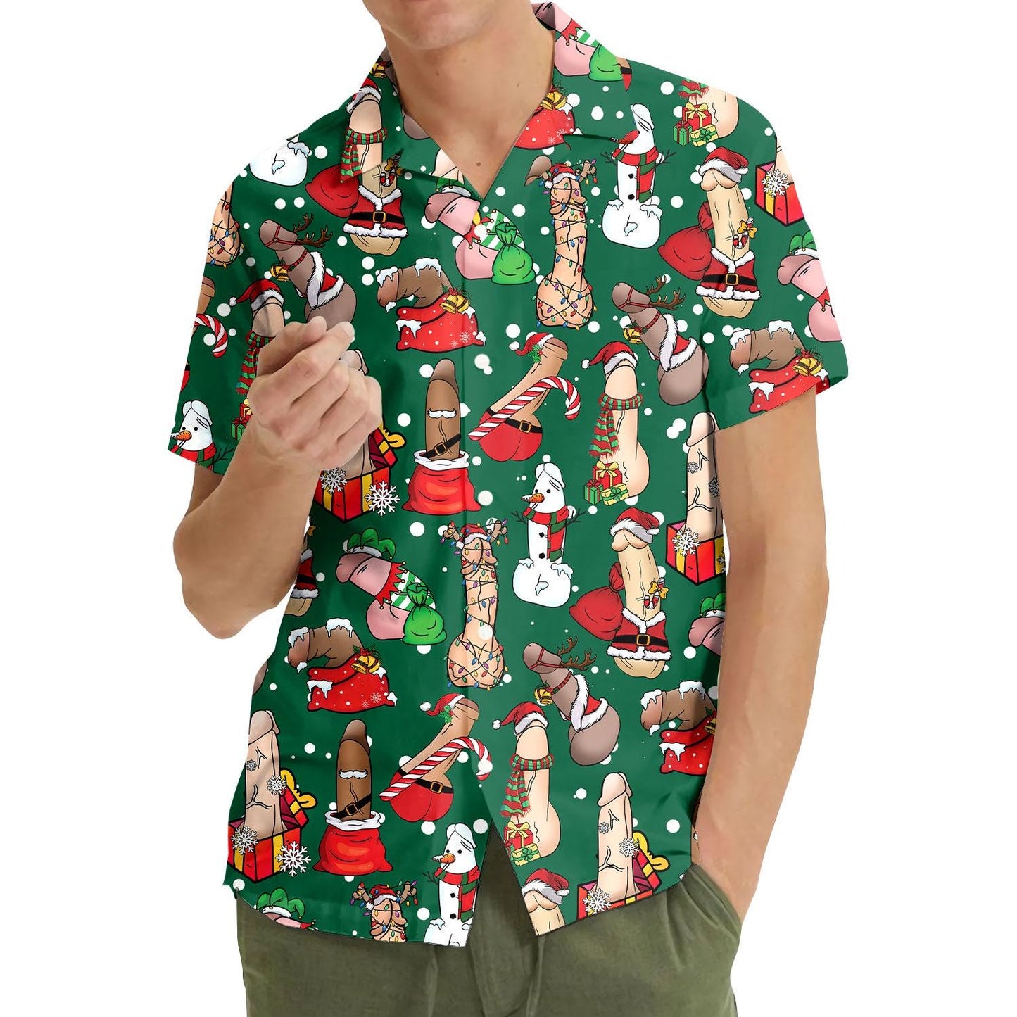 Model wearing the green Christmas Hawaiian shirt with colorful festive figures and gifts