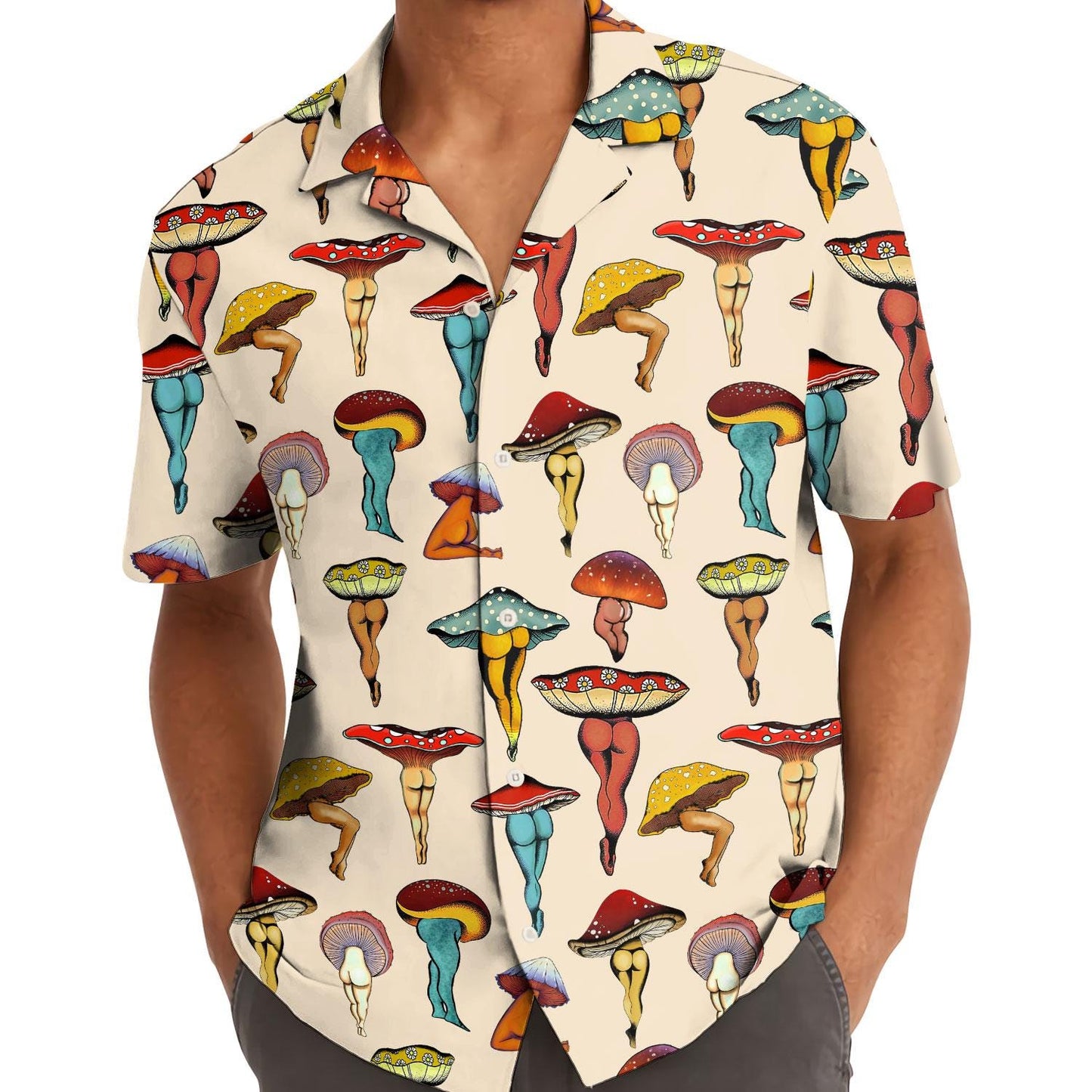 Model wearing a colorful mushroom Hawaiian shirt with short sleeves