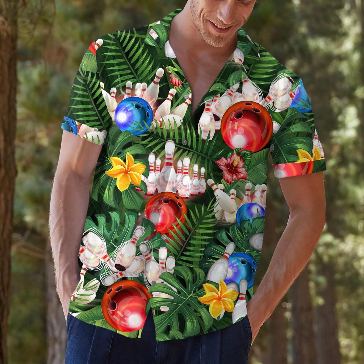 Model wearing colorful bowling and floral Hawaiian shirt