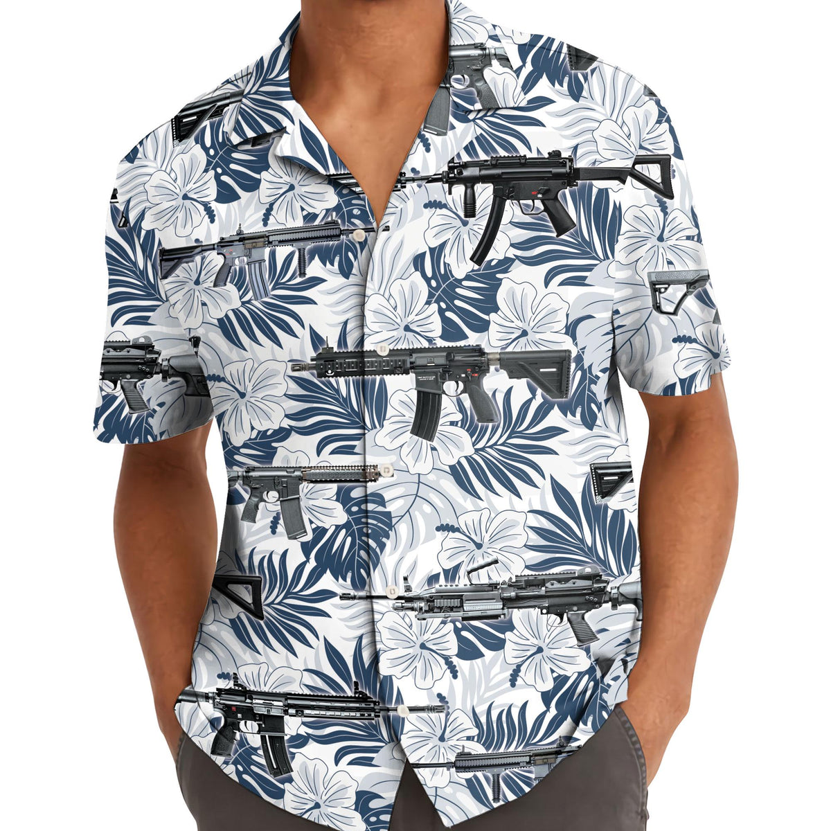 Model wearing a white and navy tropical firearm graphic Hawaiian shirt