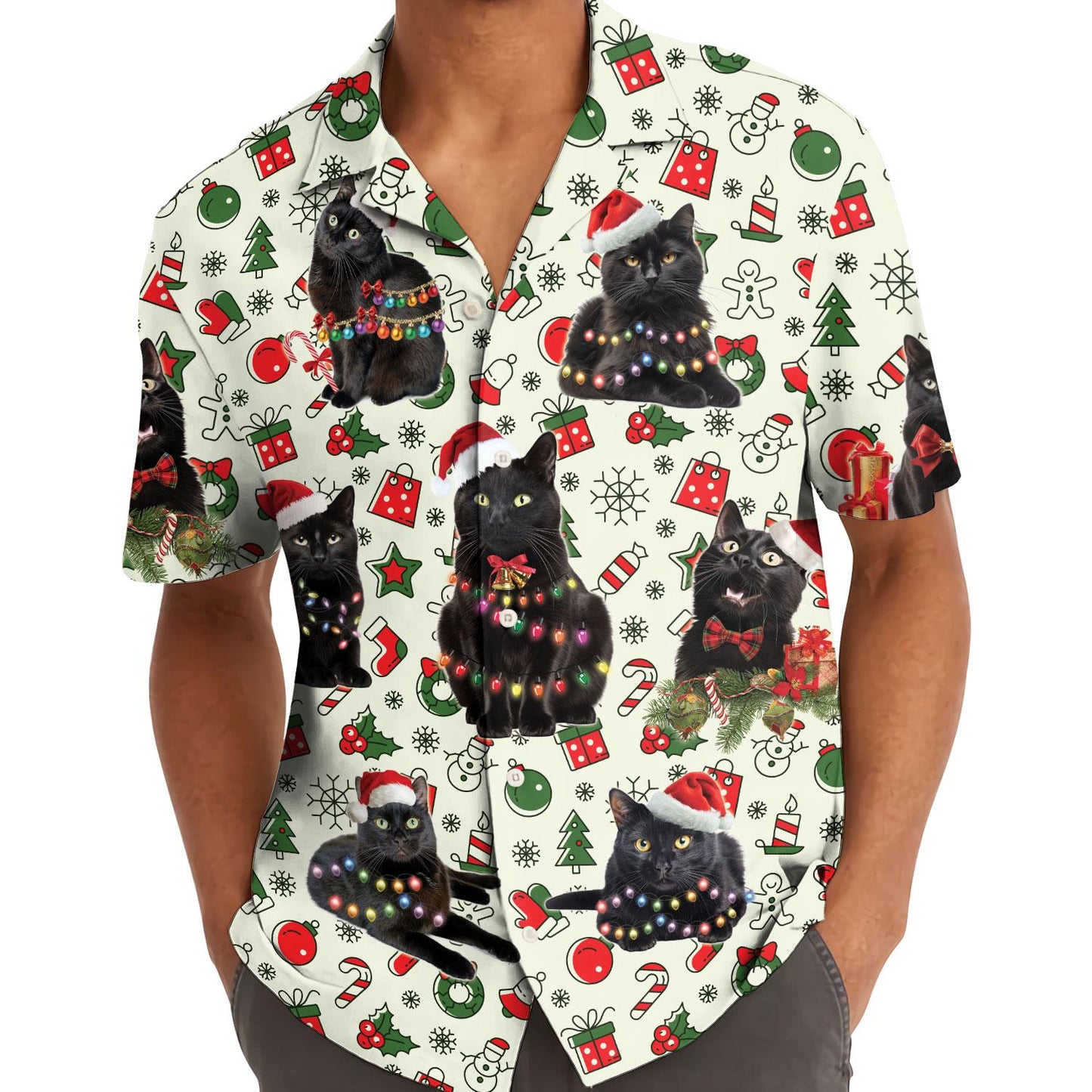 Person wearing the Christmas cat Hawaiian shirt with black cats and colorful holiday lights.