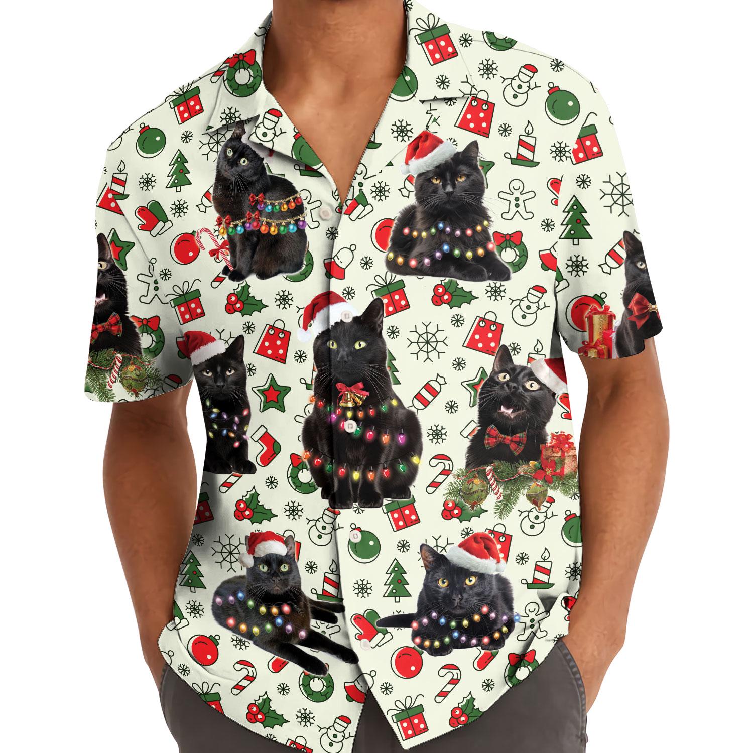 Person wearing the Christmas cat Hawaiian shirt with black cats and colorful holiday lights.