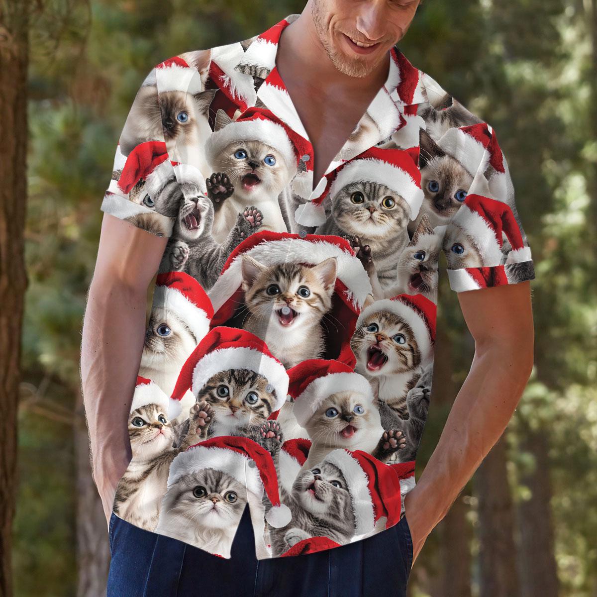 Model outdoors wearing a Christmas cat print Hawaiian shirt