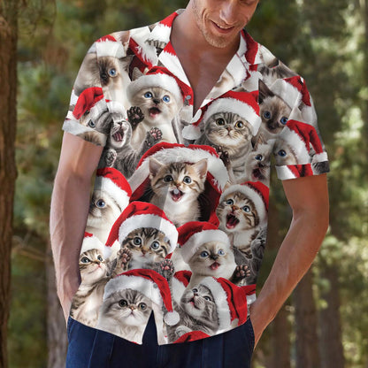 Model outdoors wearing a Christmas cat print Hawaiian shirt