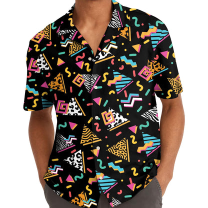 Model wearing the colorful geometric Hawaiian shirt with jeans
