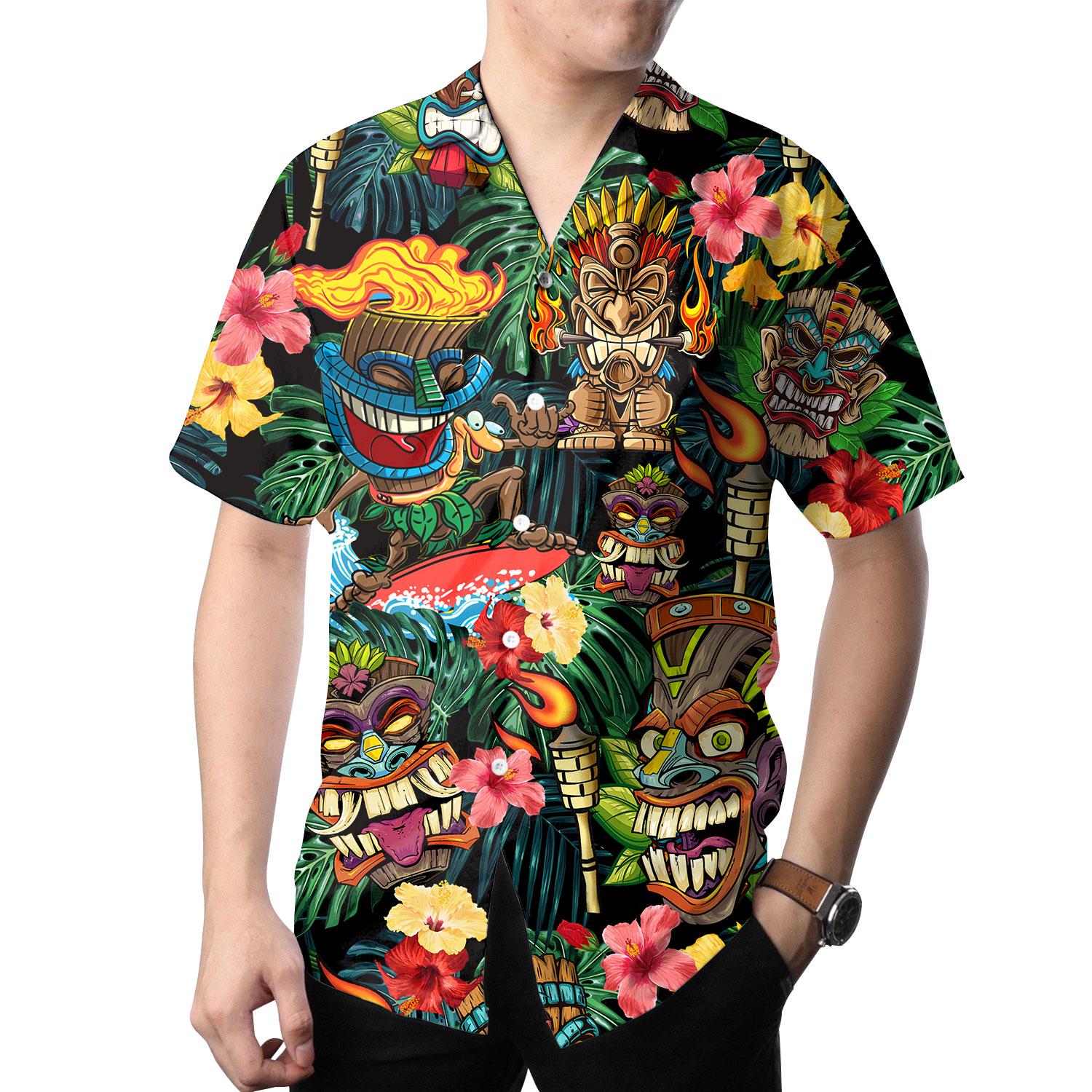 Person wearing colorful tiki mask Hawaiian shirt with tropical floral artwork