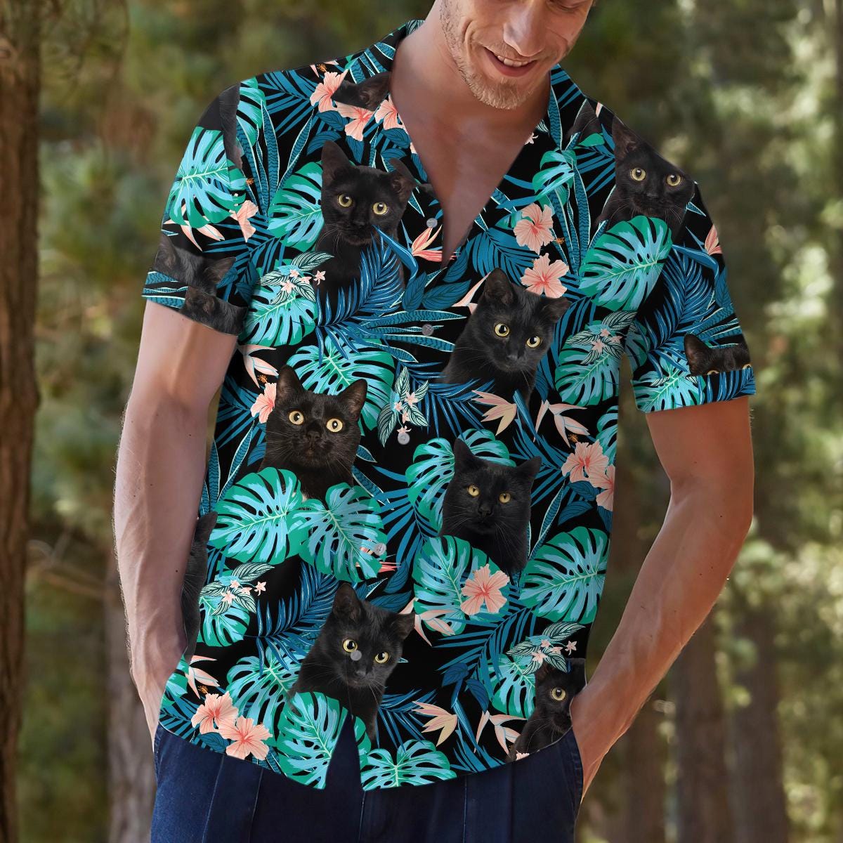 Model wearing black cat and hibiscus Hawaiian shirt with jeans