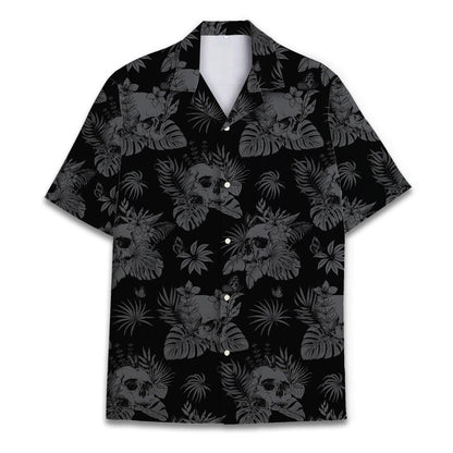 Front view of a black Hawaiian shirt with gray skulls and tropical leaves
