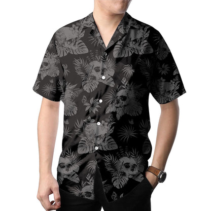 Model wearing the black and gray skull tropical shirt outdoors