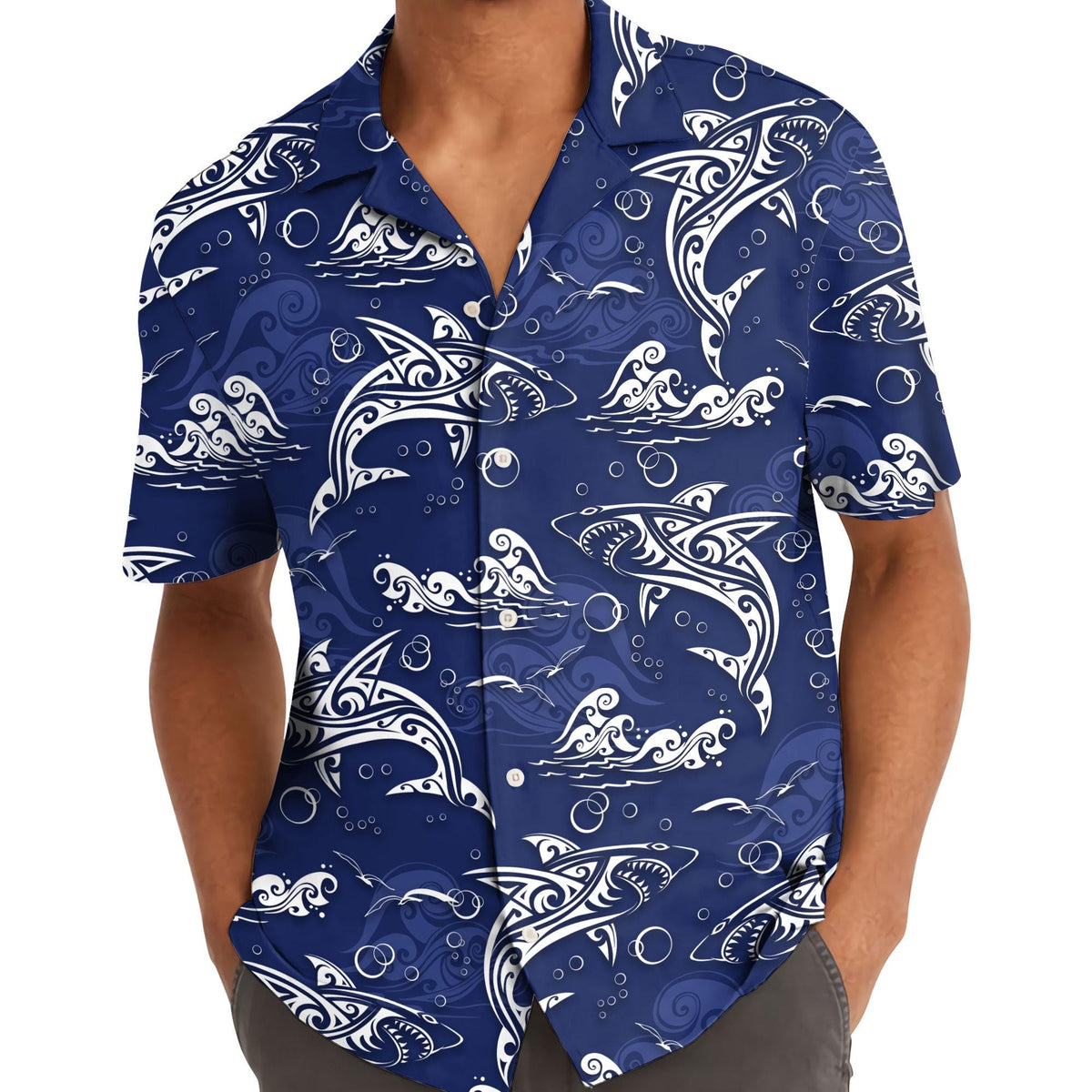 Model wearing blue dolphin and wave Hawaiian shirt outdoors