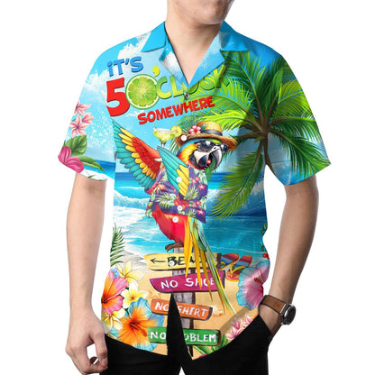 Model wearing colorful parrot Hawaiian shirt with tropical beach print