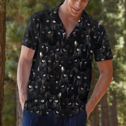 Model outdoors wearing the black feline print short-sleeve shirt