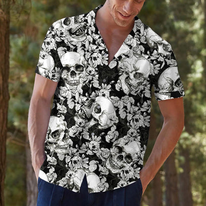 Close view of a person wearing a black and white skull Hawaiian shirt