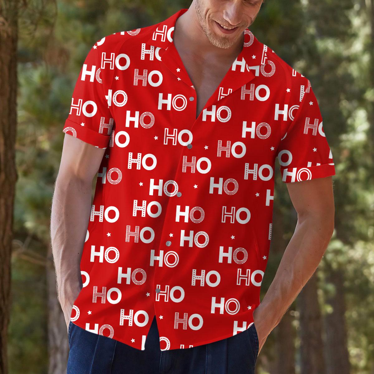 Model wearing red festive short-sleeve button-up shirt