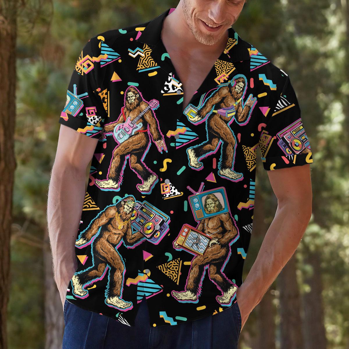 Model outdoors wearing a colorful retro Bigfoot Hawaiian shirt