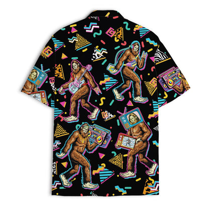 Back view of a black Hawaiian shirt featuring dancing Bigfoot figures and retro shapes