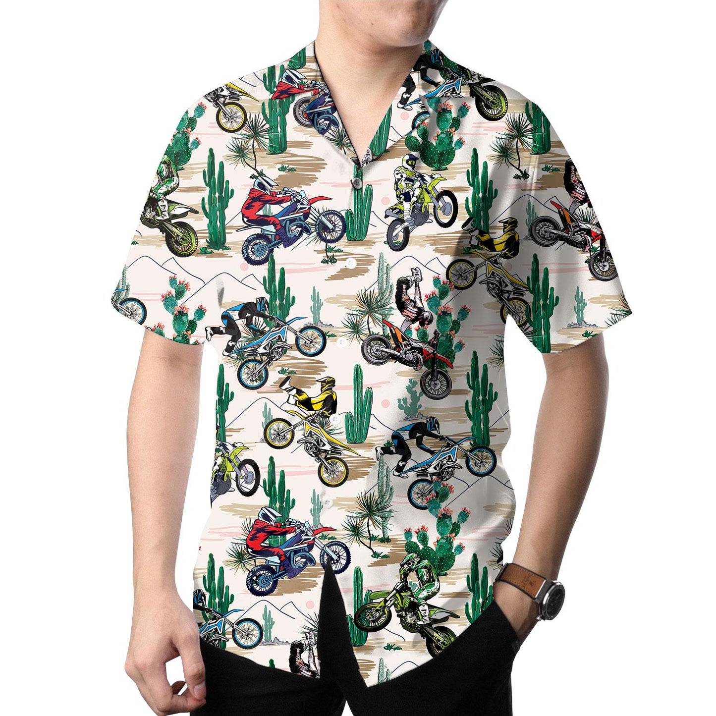 Model wearing a colorful dirt bike and cactus Hawaiian shirt with dark pants