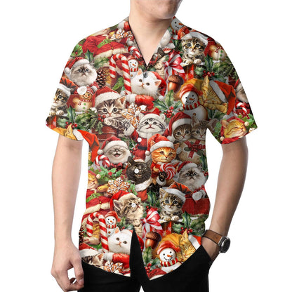 Person wearing a Christmas cat Hawaiian shirt with Santa kittens and holiday motifs