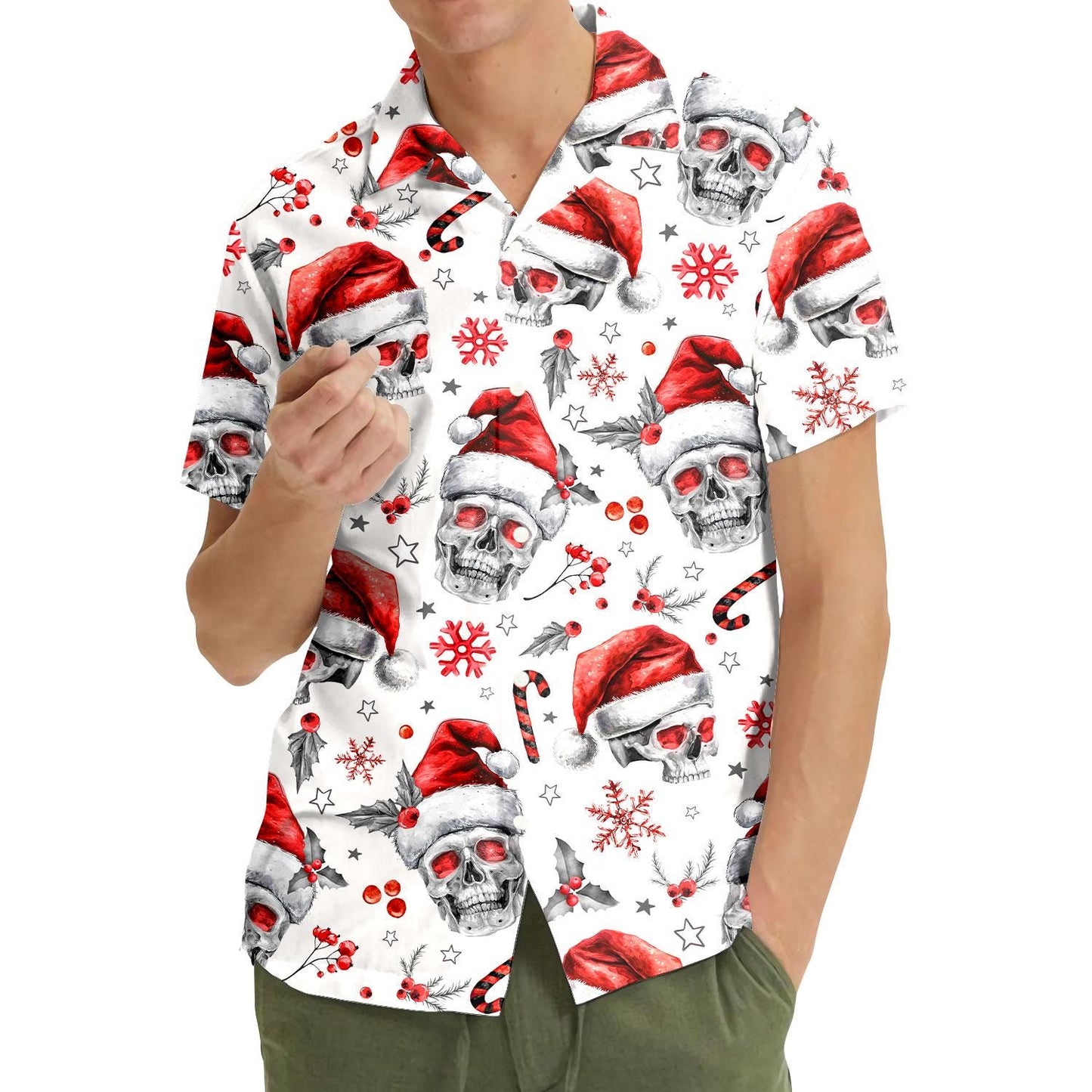 Model wearing Christmas skull Hawaiian shirt with Santa hats and candy cane details