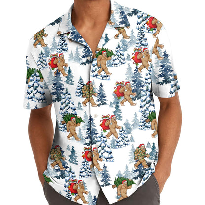 Model wearing a festive Bigfoot Hawaiian shirt with a snowy woodland print