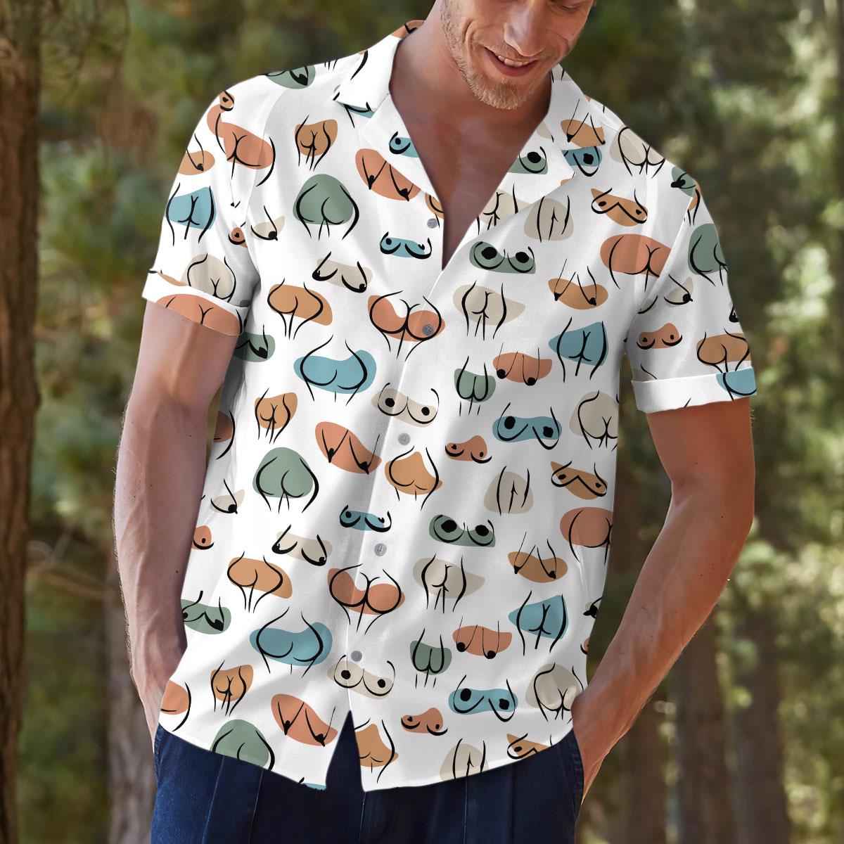 Model wearing the patterned Hawaiian shirt in a relaxed summer outfit