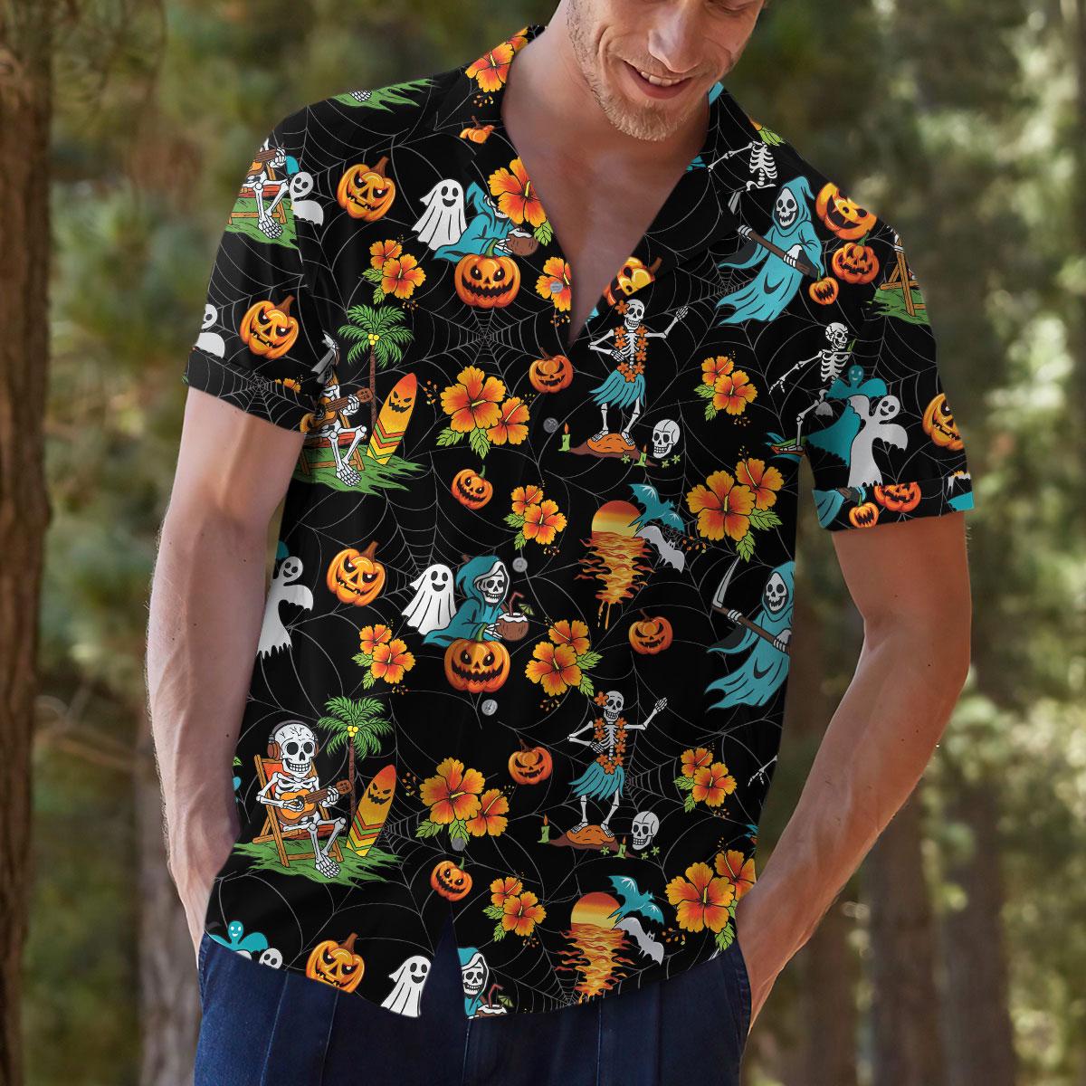 Outdoor view of a model wearing a black tropical Halloween Hawaiian shirt