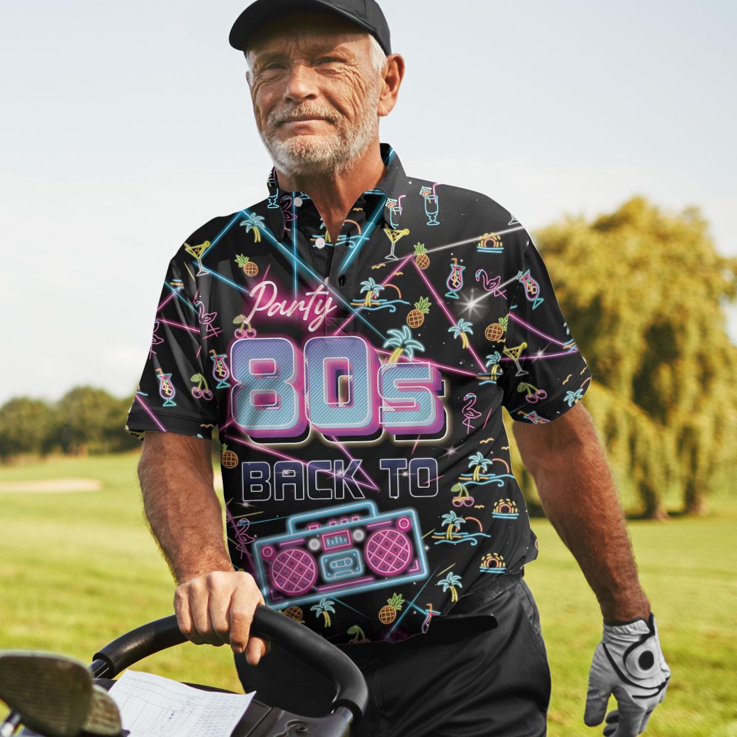 Person wearing the neon 80s party Hawaiian shirt outdoors on a golf course