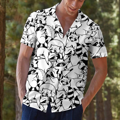 Model outdoors wearing the black and white raccoon Hawaiian shirt in a casual setting