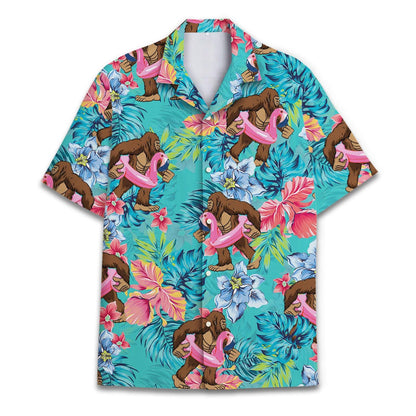 Front view of a turquoise Hawaiian shirt with brown apes carrying pink flamingo floats among tropical flowers and leaves